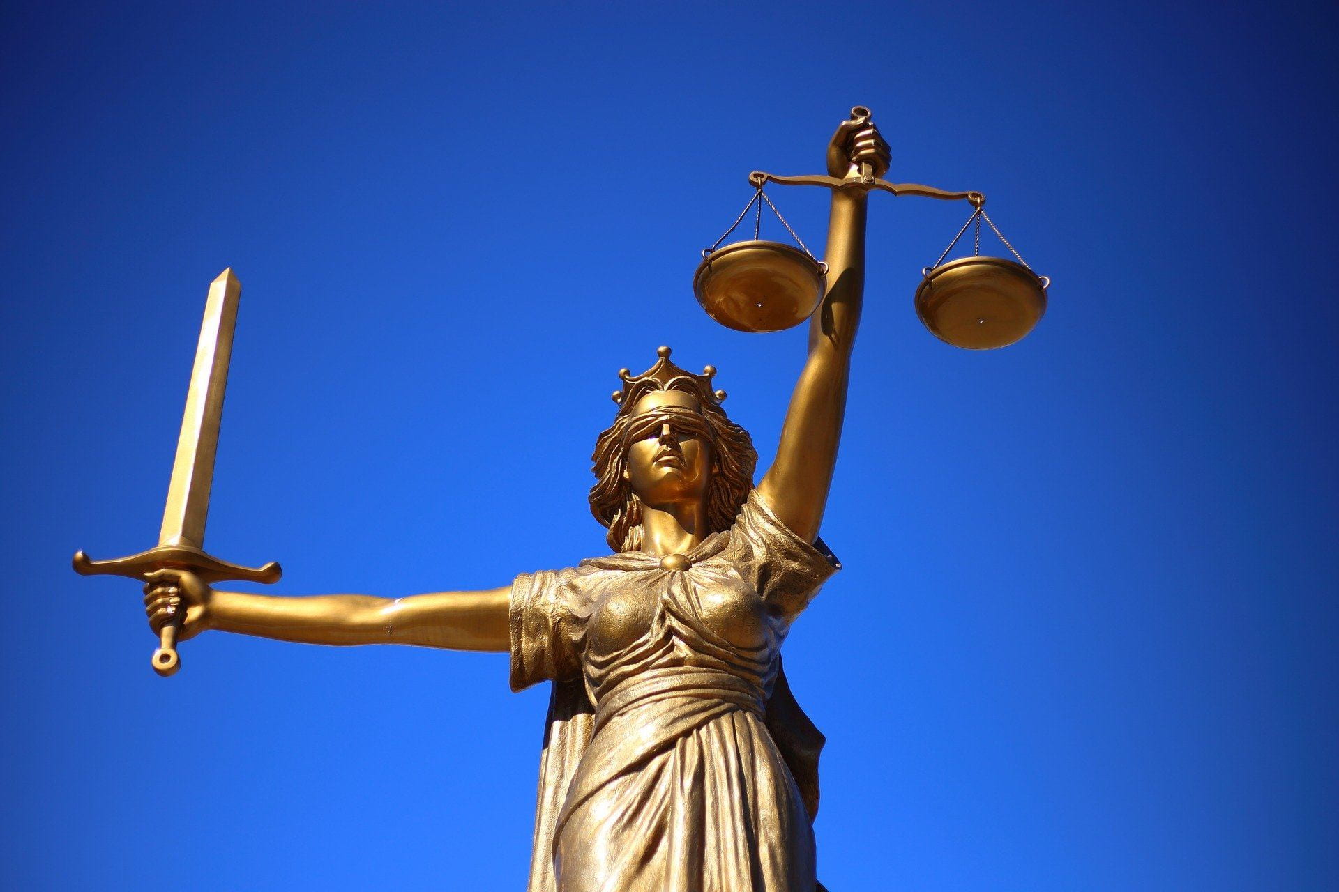 Lady Justice holding scales and a sword